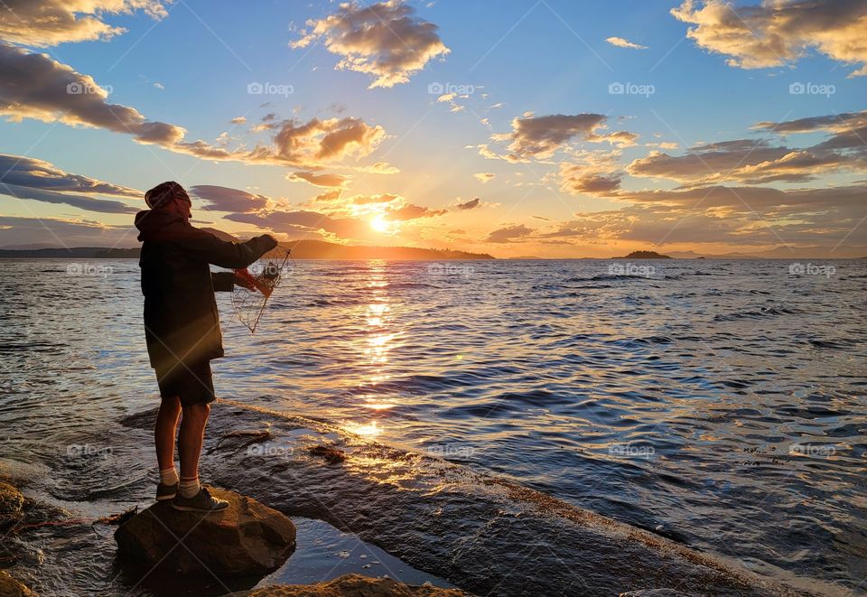 crab fishing at sunset