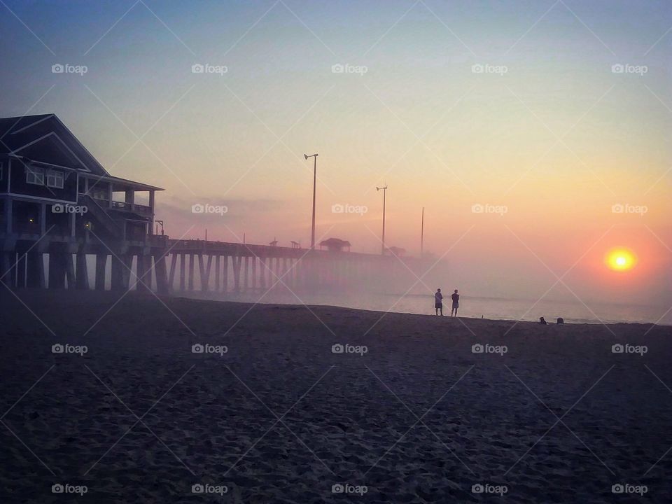 Foggy sunrise at the pier.