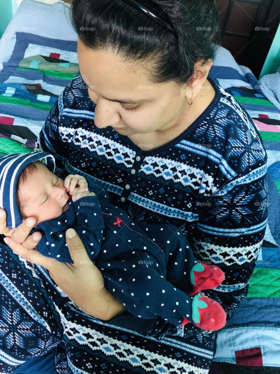 Mommy holds newborn baby, mommy and newborn baby girl, tender first moments at home, holding a newborn 