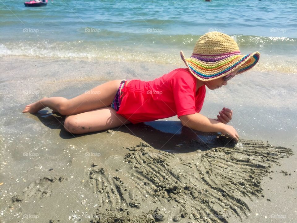 Kids playing in the sand