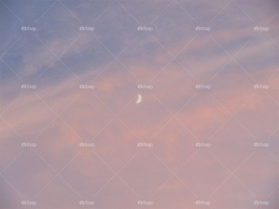 surreal moon with clouds