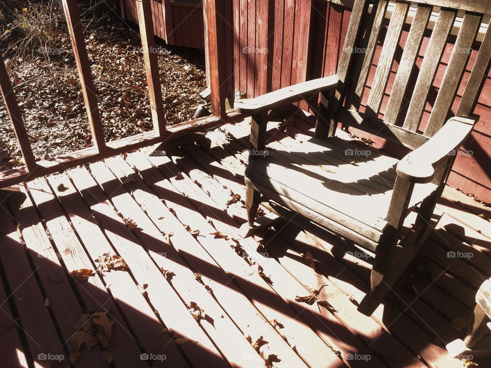 Wooden rocker in afternoon light