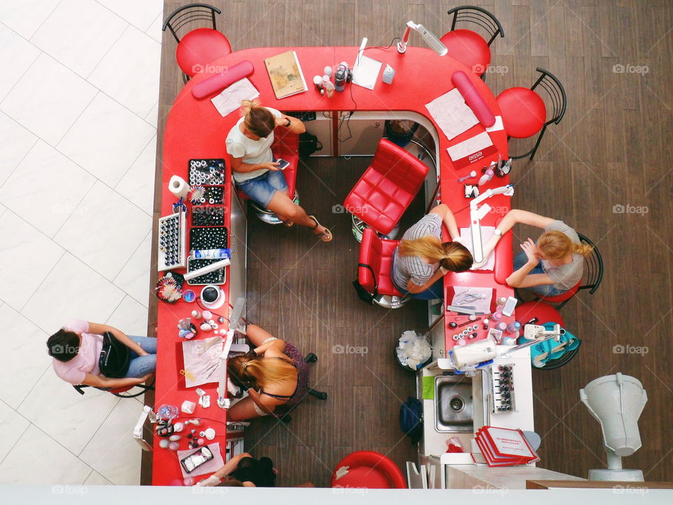 cosmetic services for girls in the mall, top view