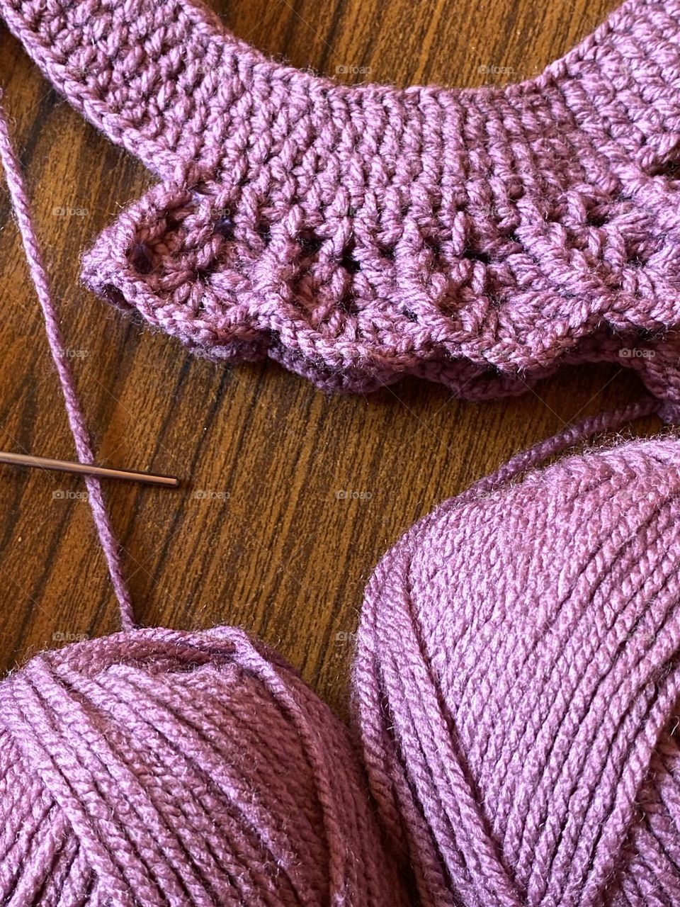 Making handmade woolen clothes 