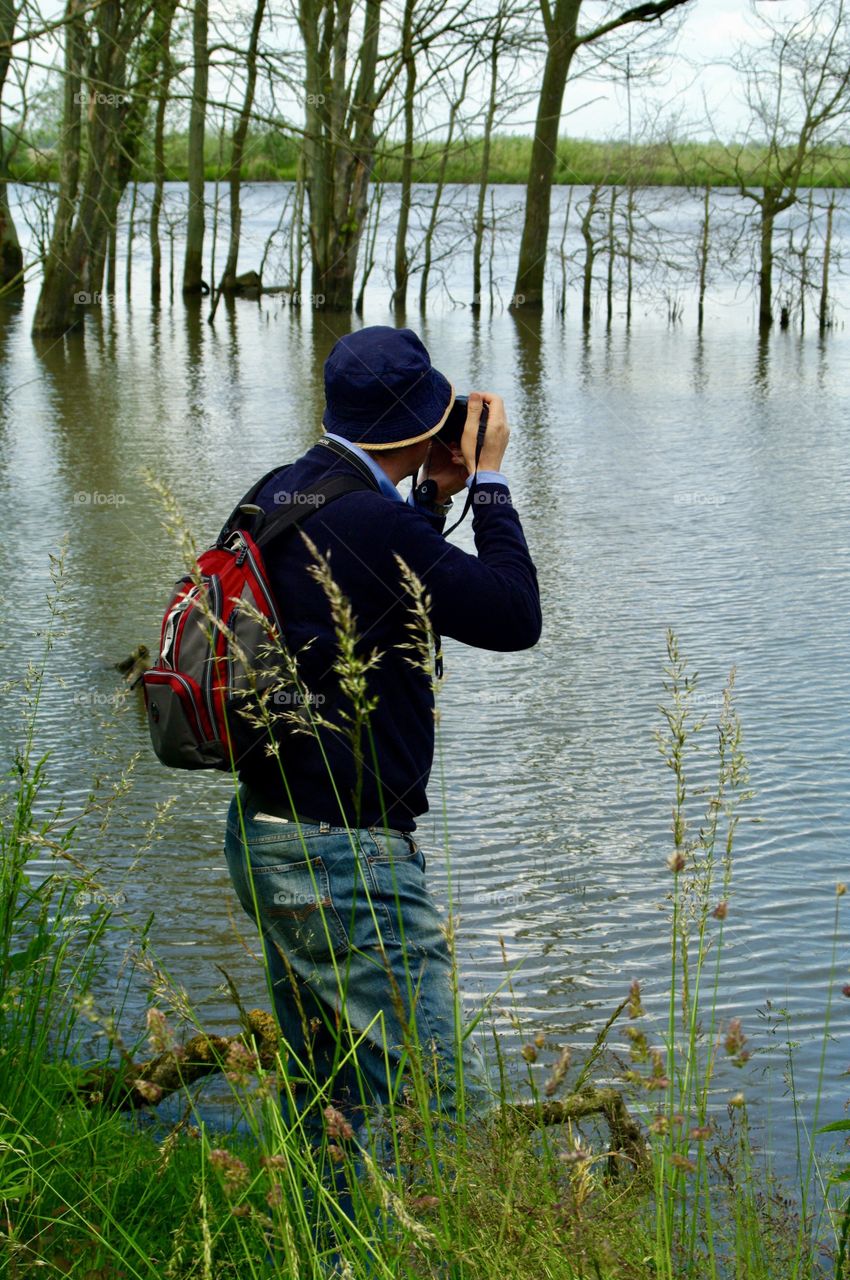 A photographer in the nature.