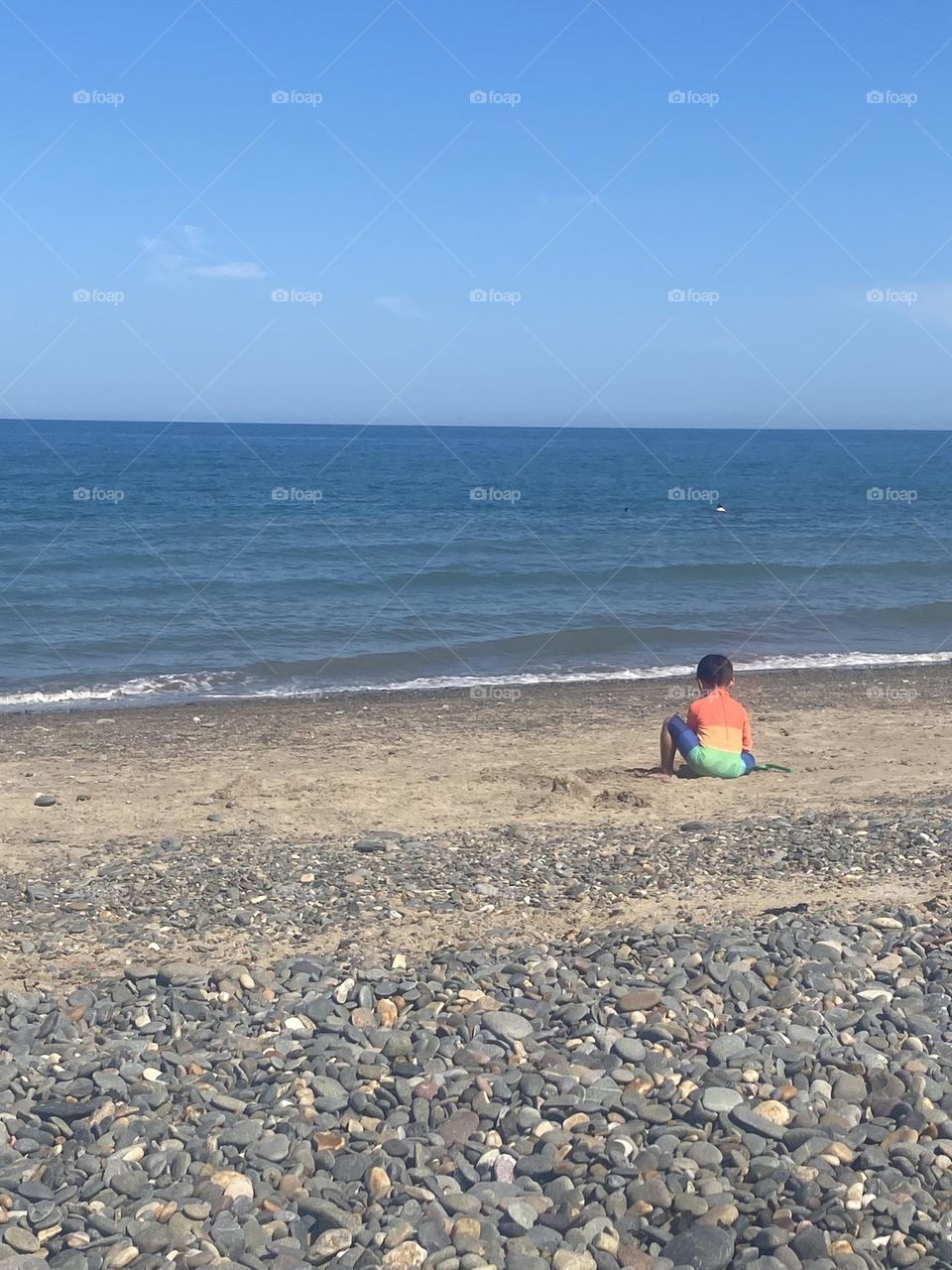 Playing on the seashore on a sunny summer day.