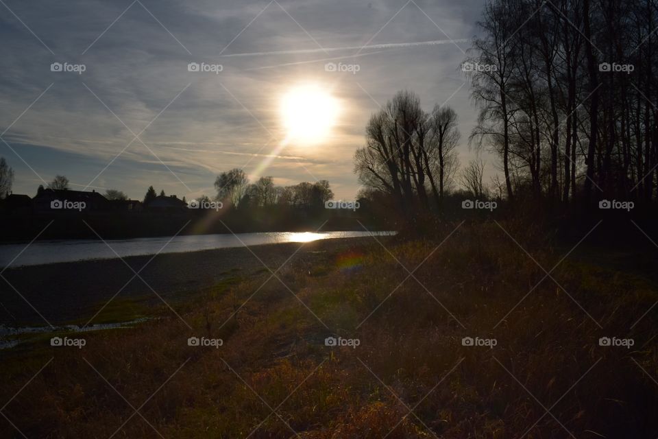 sunset by river