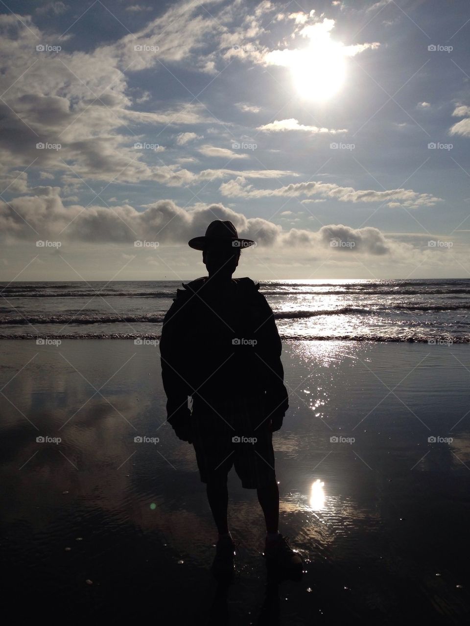 The shadow man. Beach
