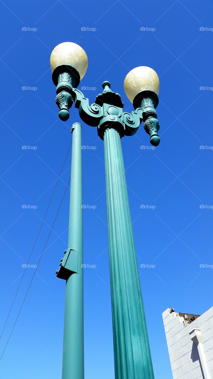 Old style street lamps. Retro street lights in downtown business district 