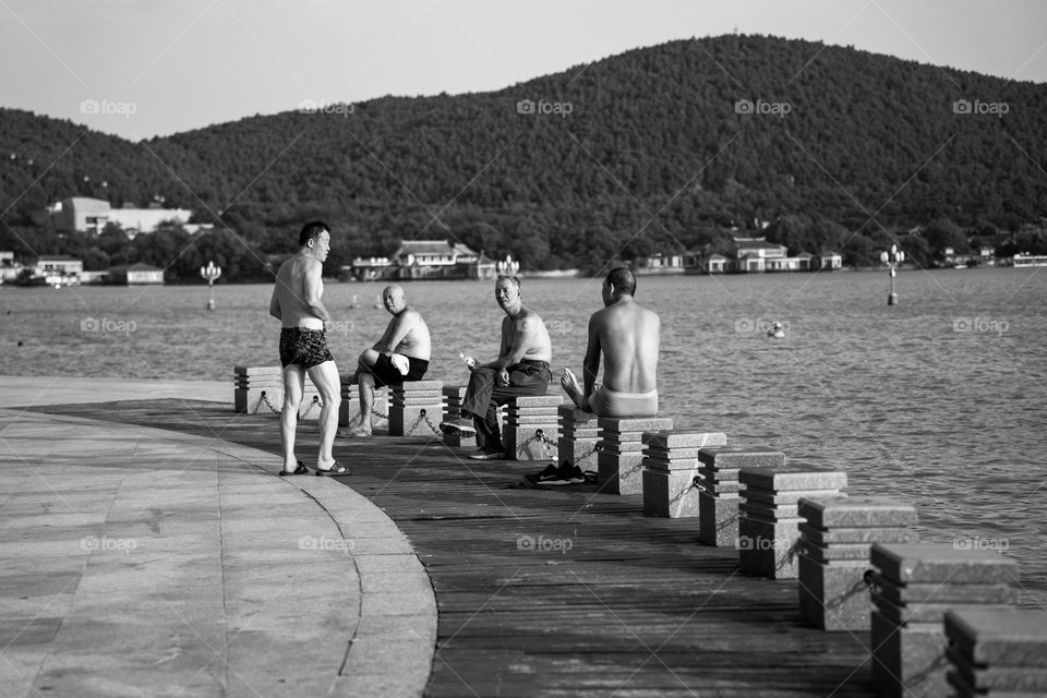 People resting after swimming.