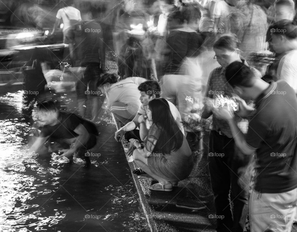 Young couple pray on Thailand Loy Kratong Festival