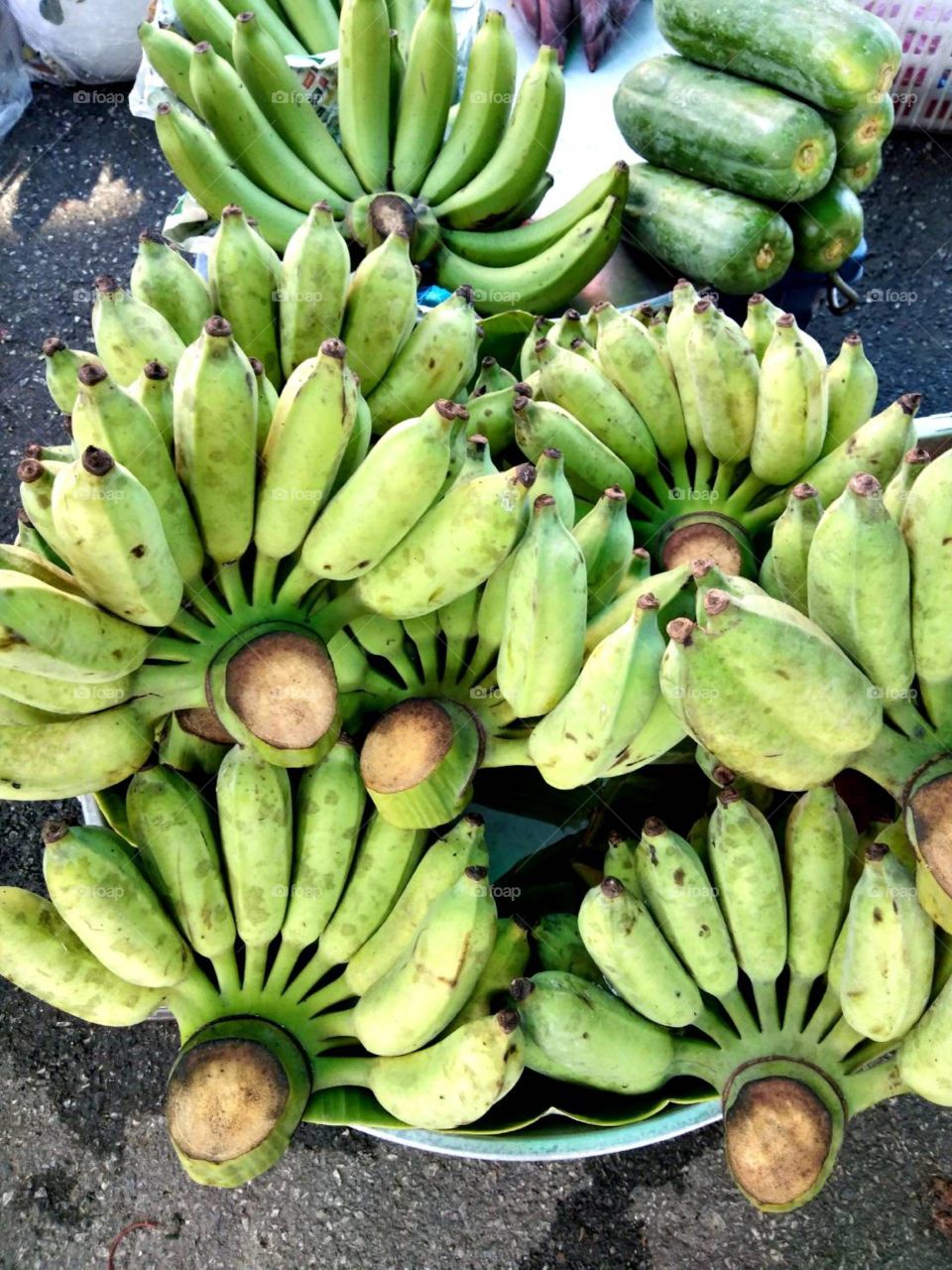 Green Banana and Green Papaya for sale.
