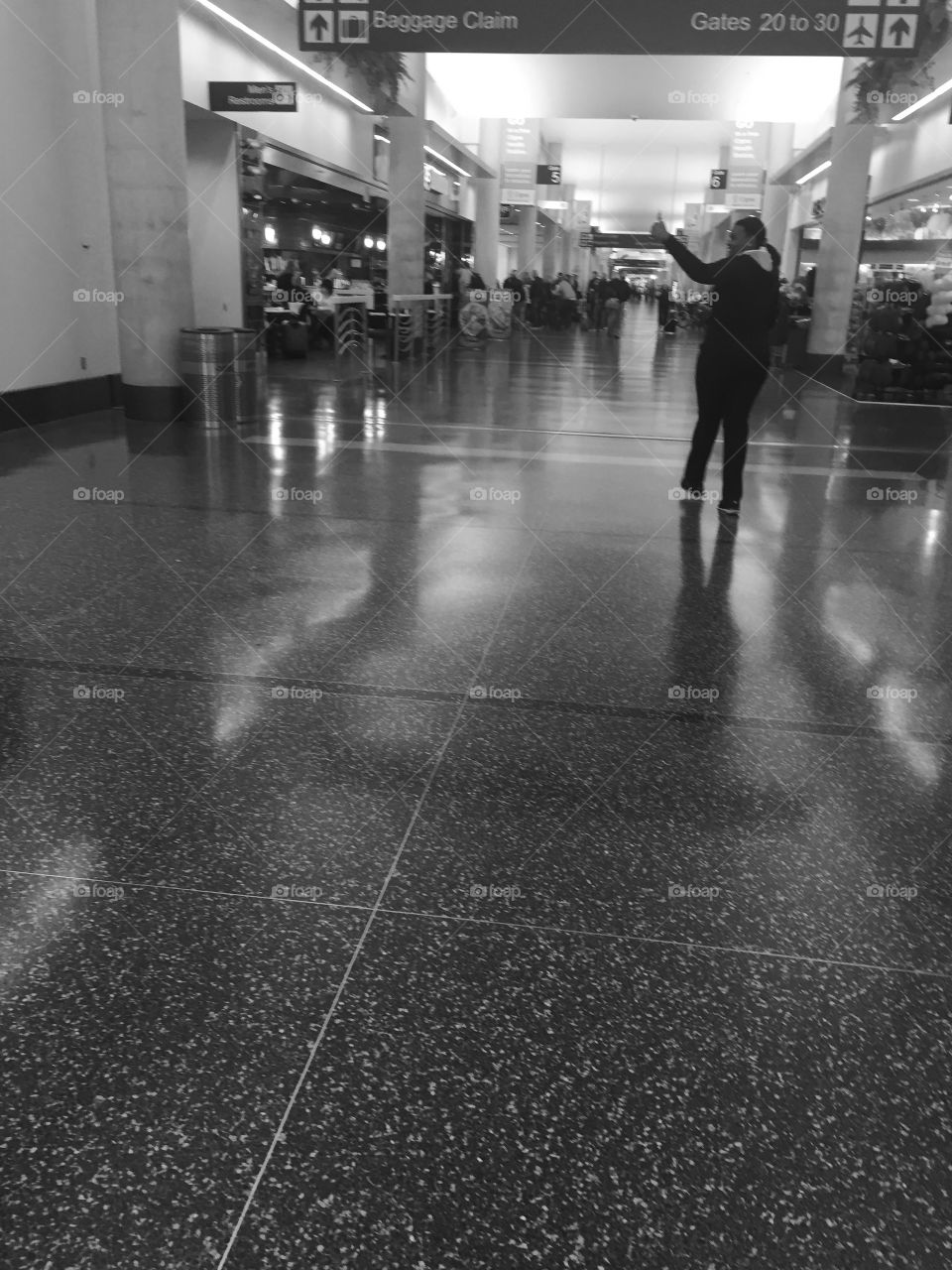 Woman walking thru airport