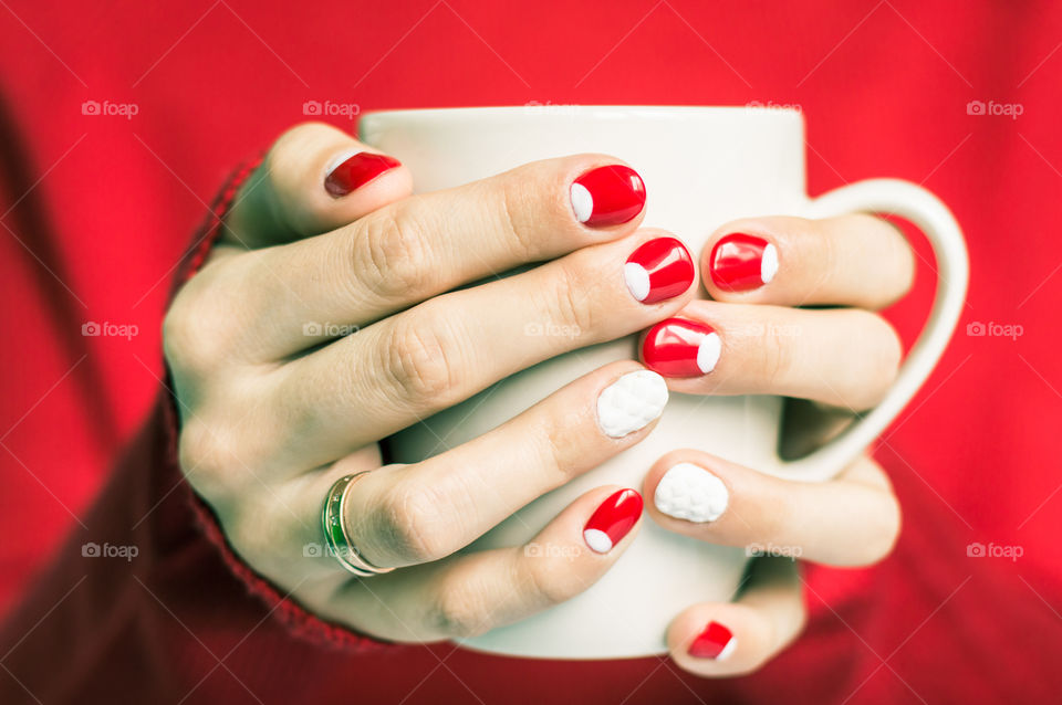 woman hand with cup of tea