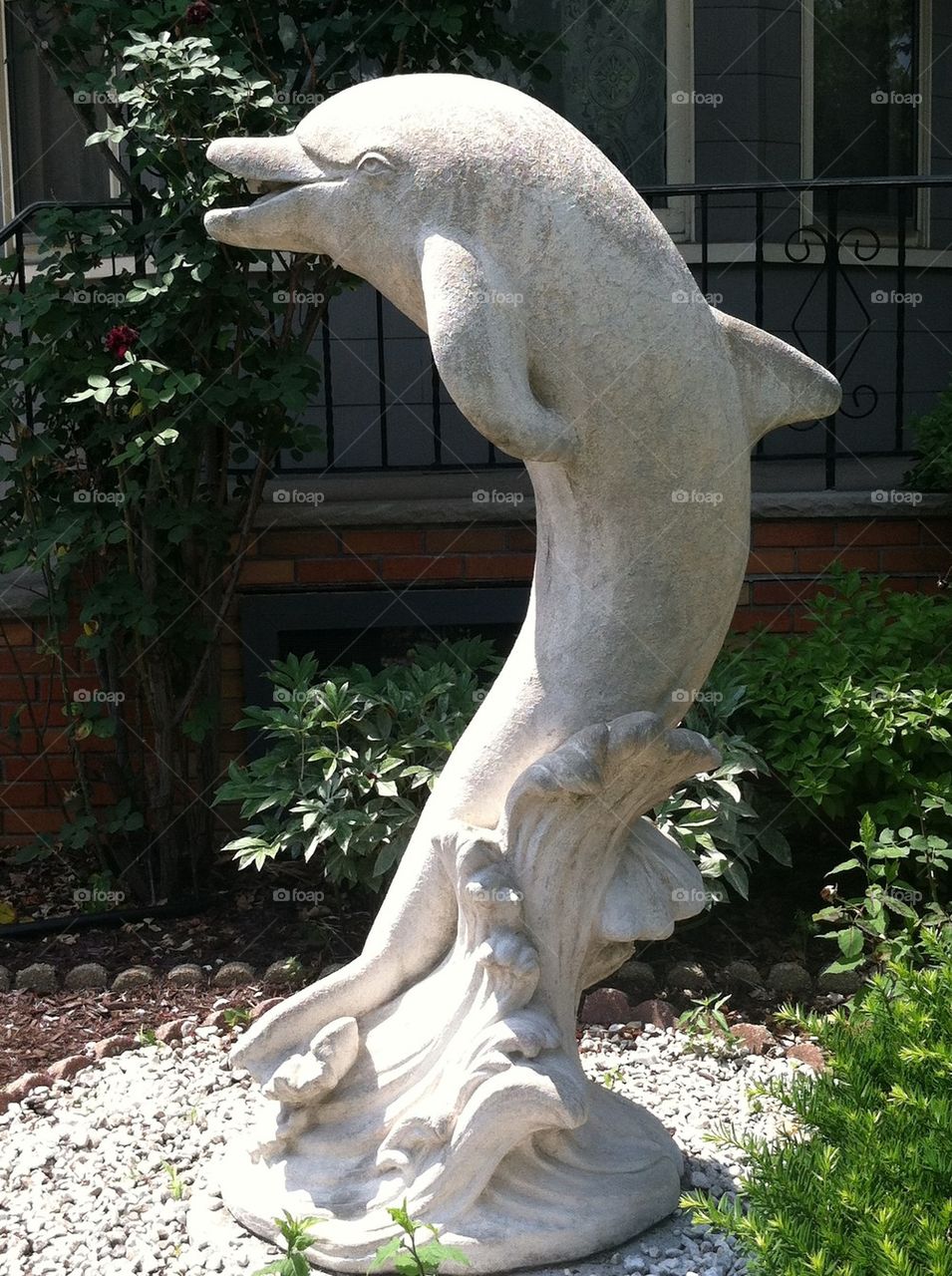 Dolphin cement statue