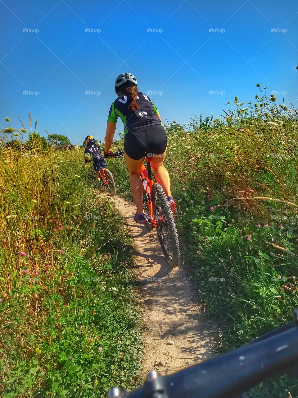woman rides in field