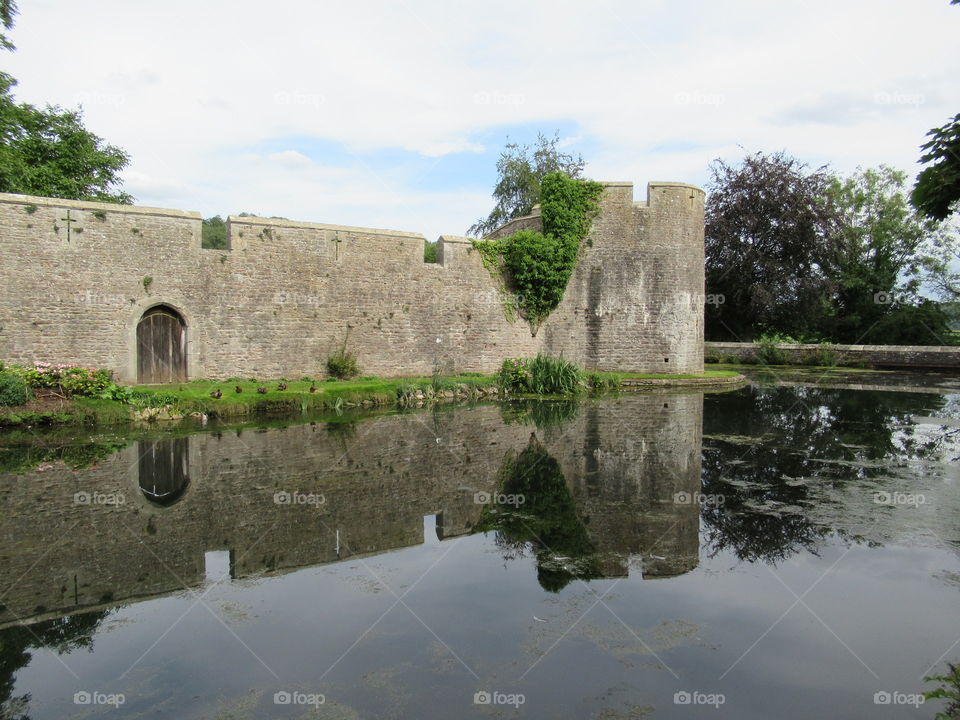 Wells moat with reflection on water
