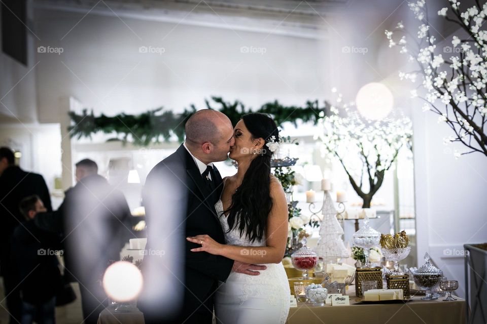 bride and groom kiss