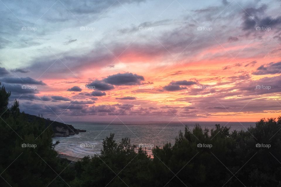 Scenic view of peschici at sunset