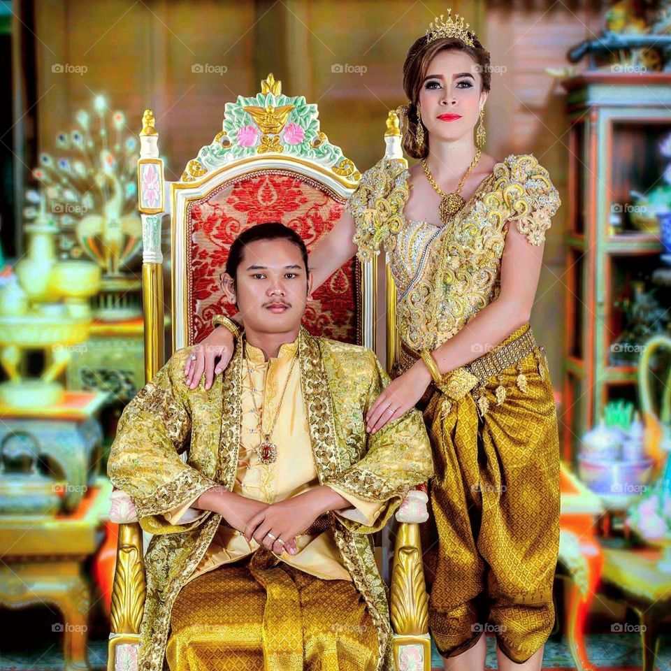 Cambodian wedding traditional out fit | this is how Cambodian people wear during their wedding ceremonies in Cambodia | This is one of the 7th outfits that Cambodian people wear during the ceremony | clothes are full of goal and rich structure of ancient and its fashion | In the photo most of them must have very serious faces. 