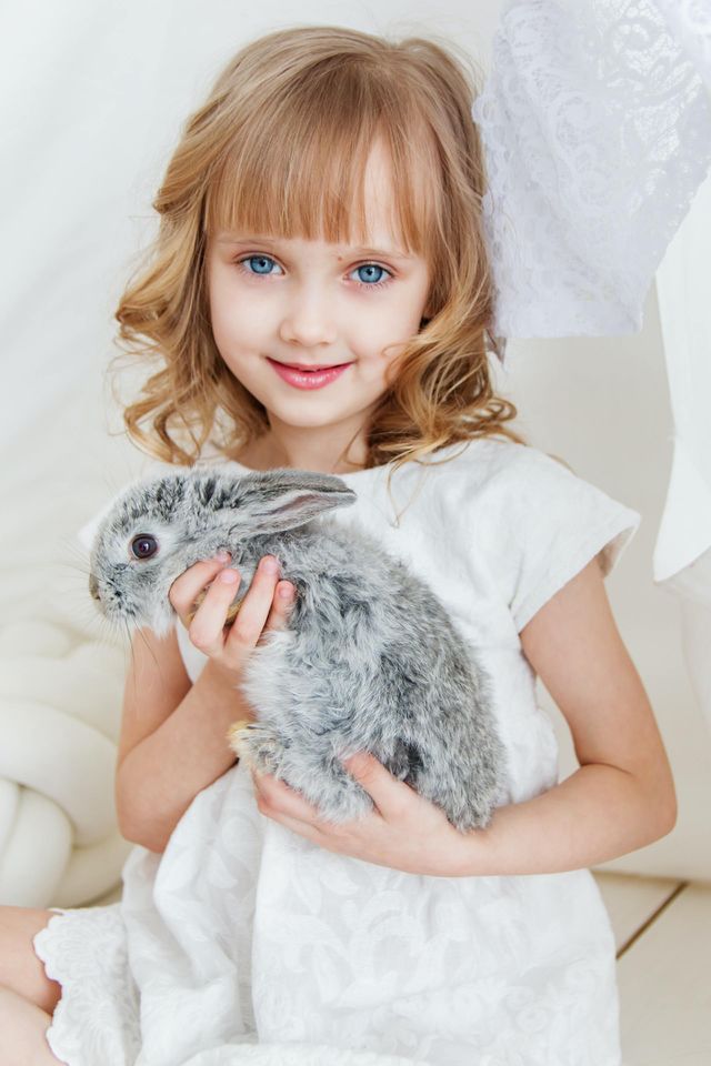 cute baby with baby rabbit