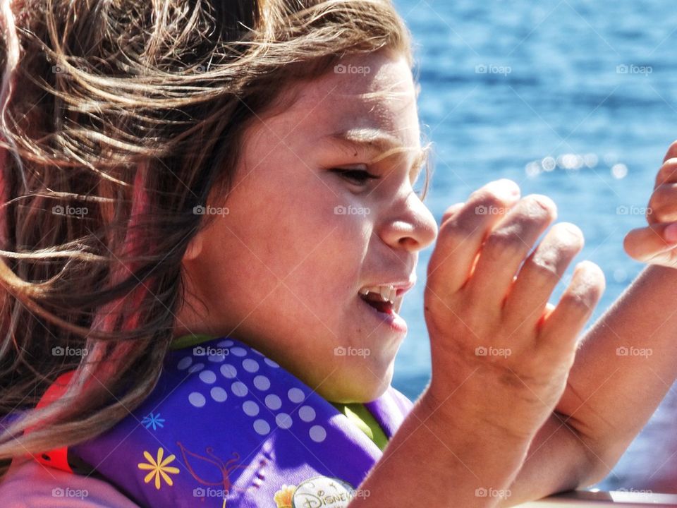 Girl With Windy Hair. Wind Blowing Through Young Girl's Hair
