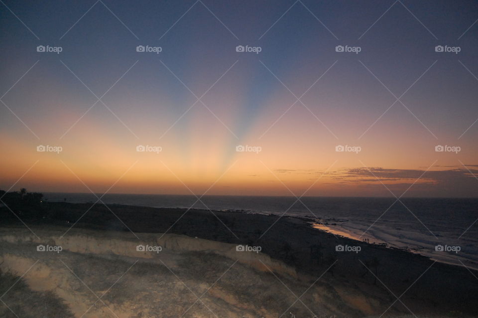 Soft colors: sun rays at sunset 