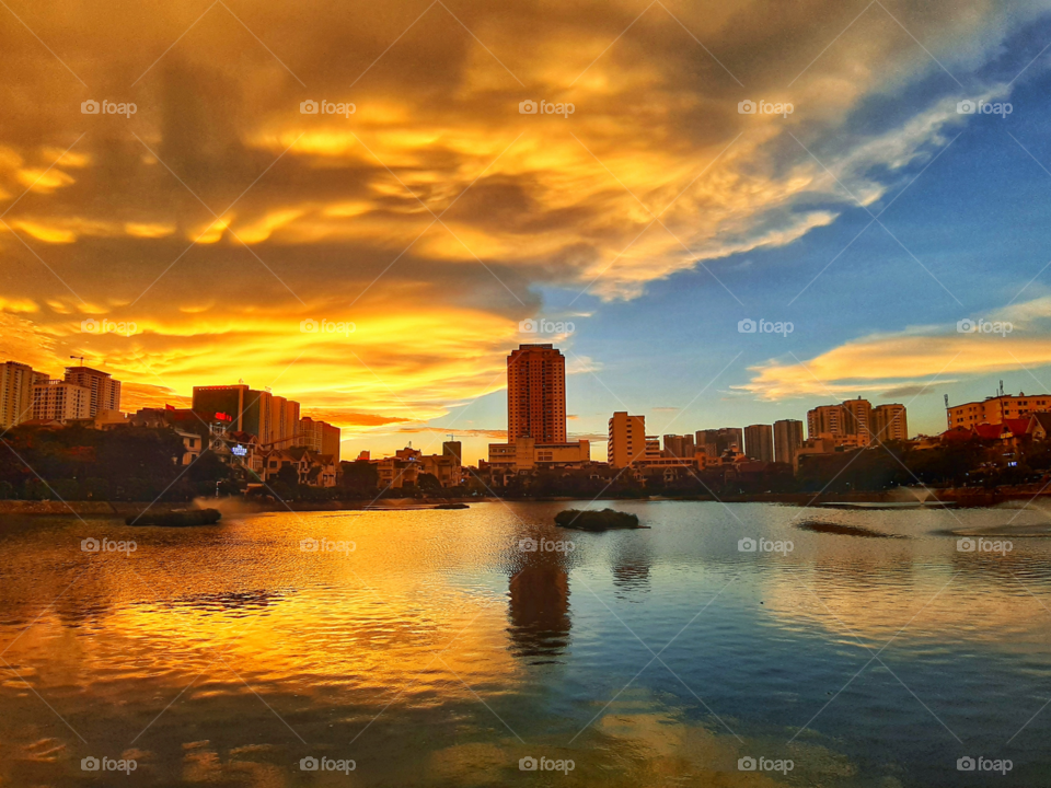 Sunset in Van Quan lake in Ha Noi city , Vietnam