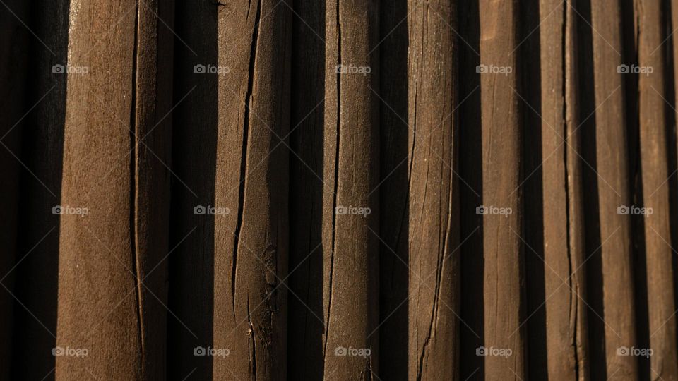 Wooden background, lights and shadows 