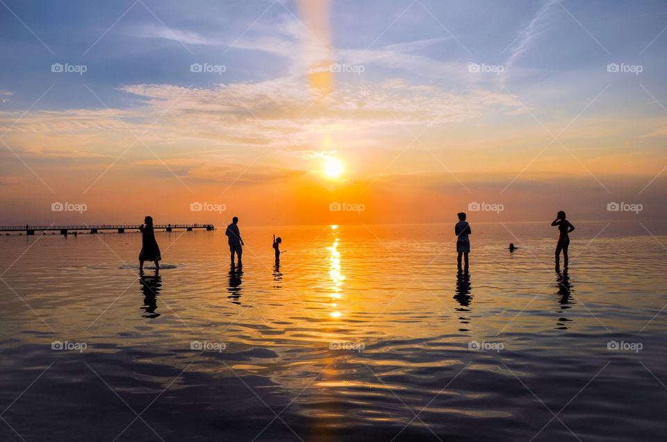 People enjoying at beach