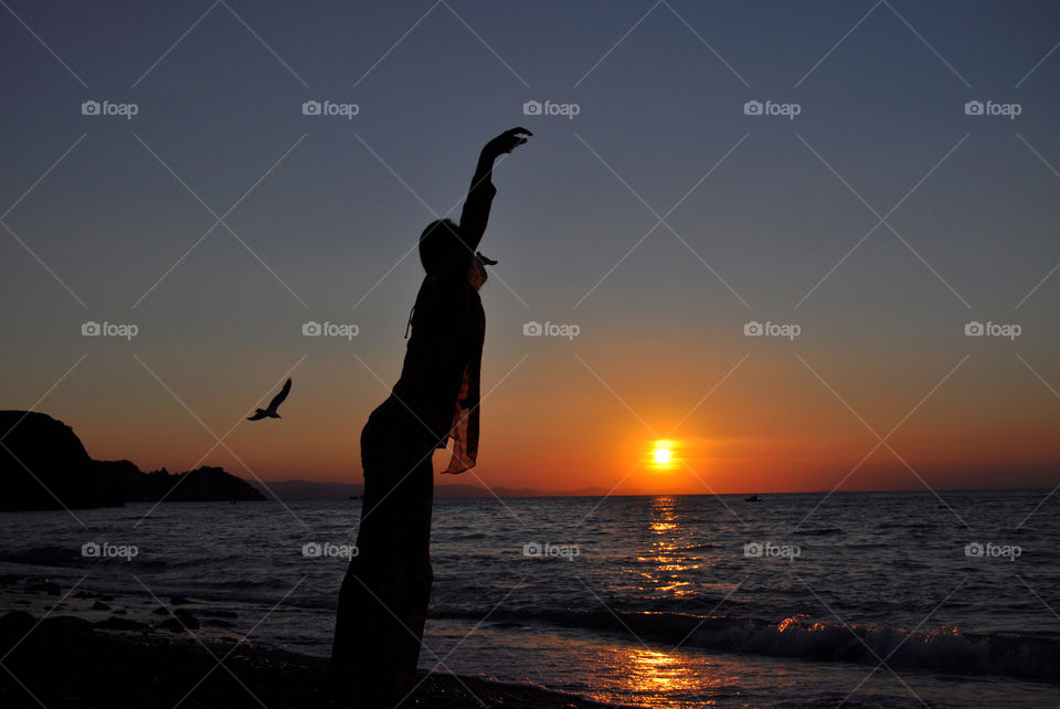 silhouette at the Sea during sunrise