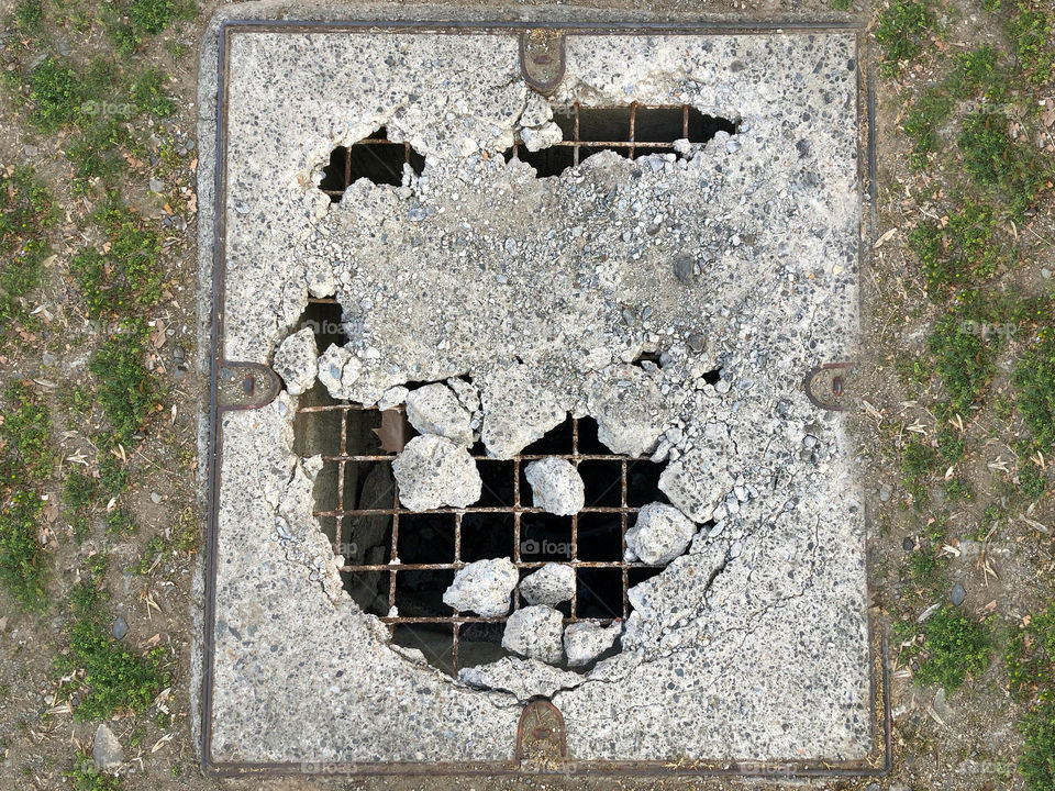 sewer cover with face shape