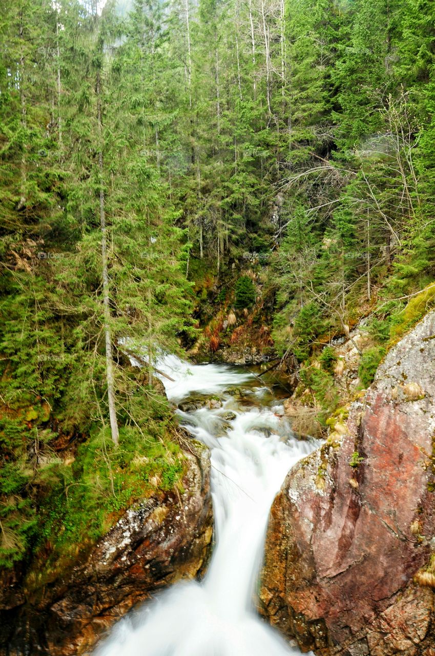 waterfall in mountain forest in Poland