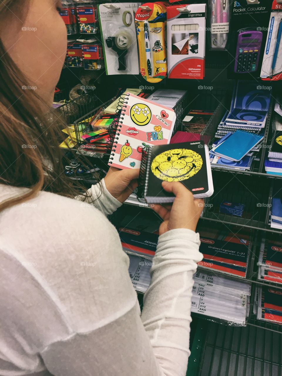 A teen shopping for school