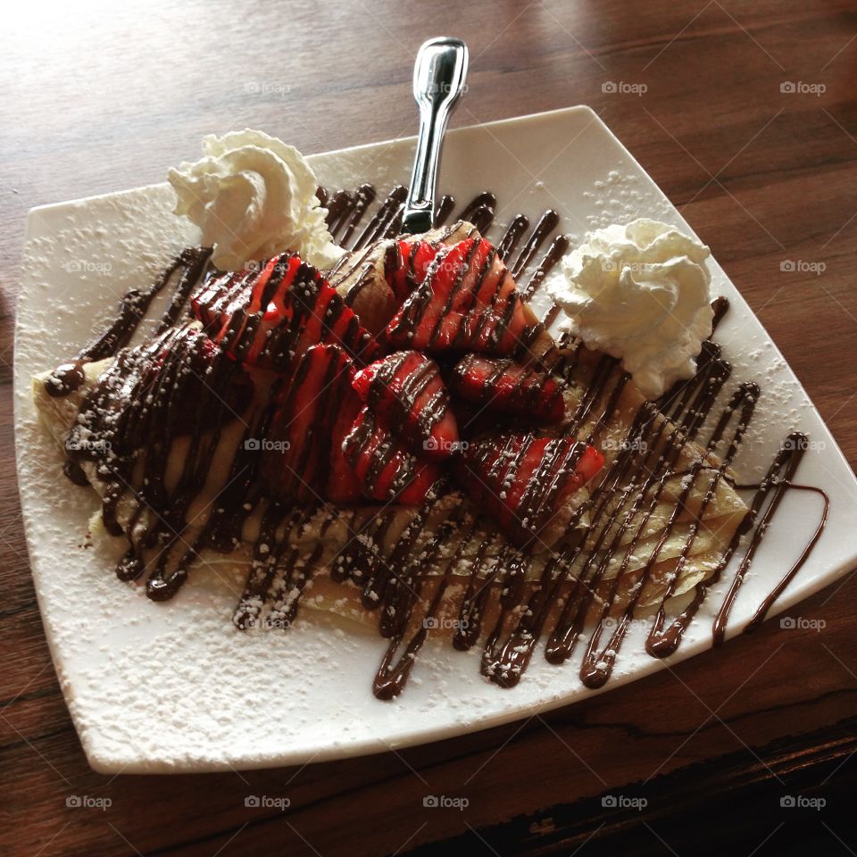 Crepe with strawberries and chocolate 