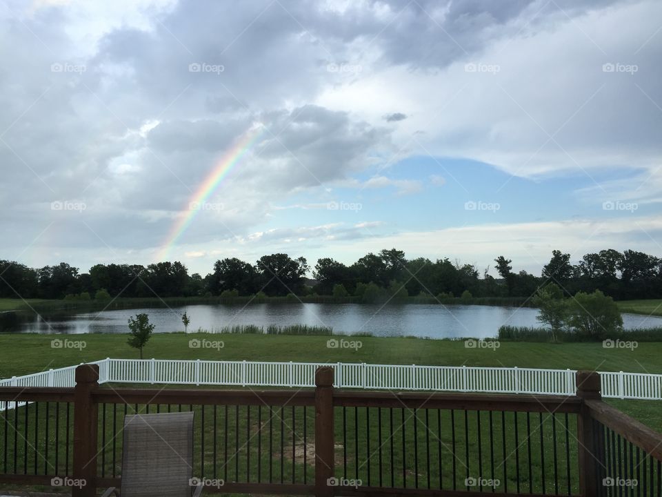 Rainbow over the lake. Rainbow over the lake