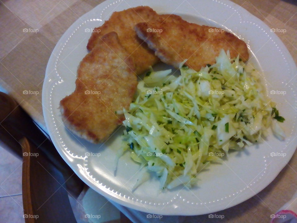 pork and salad. simple to prepare as to take a photo.