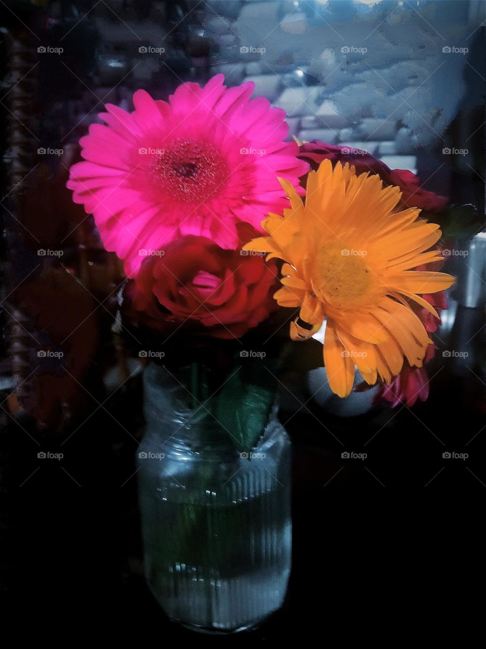 beautiful flowers in a glass jar