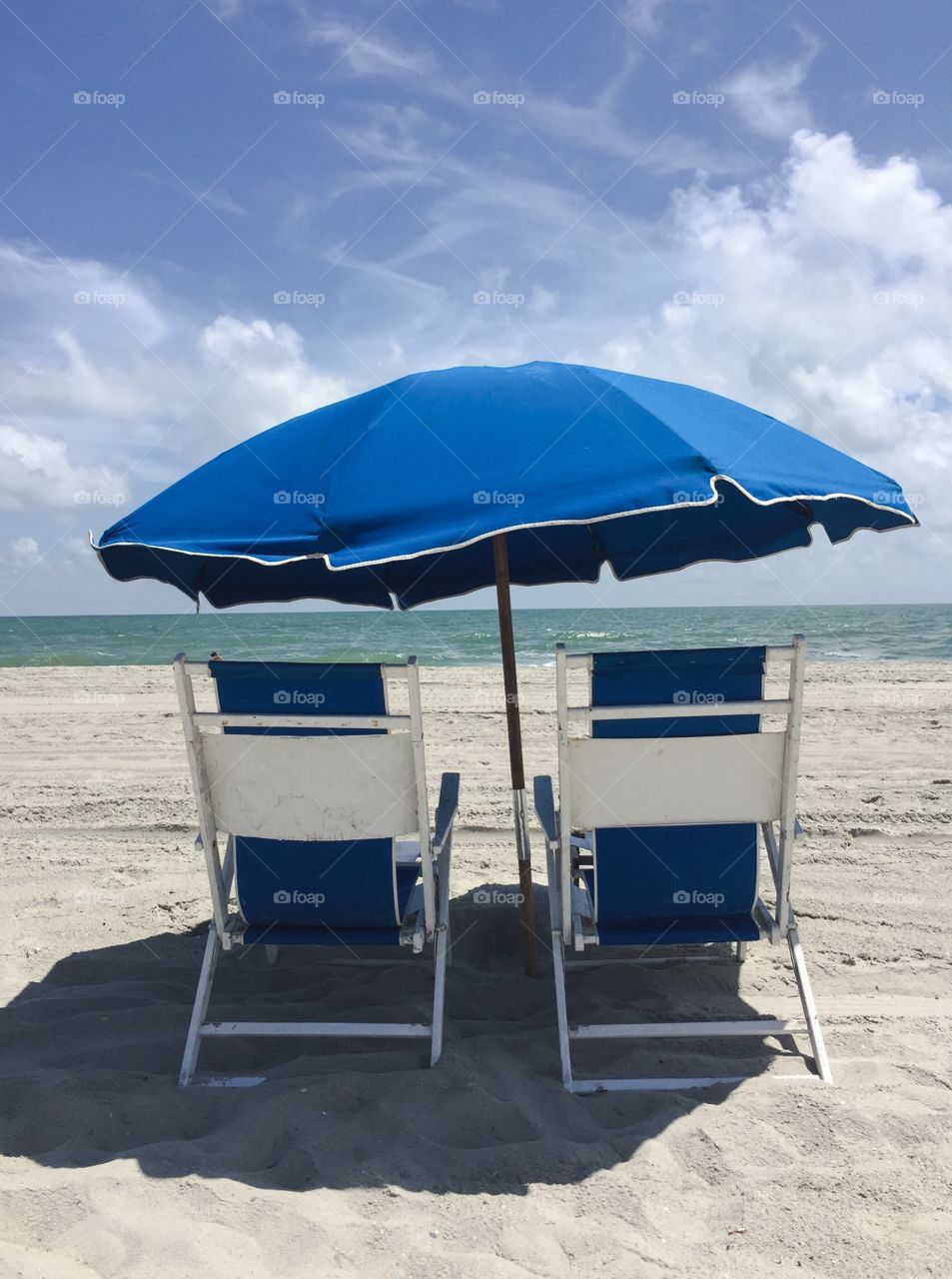 Beach chairs and umbrella 