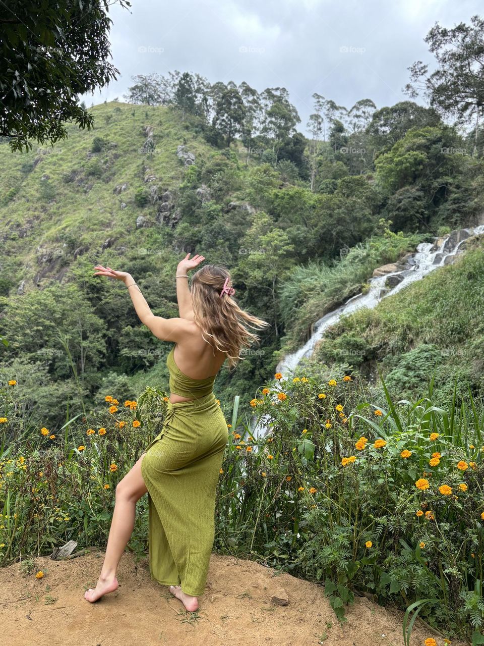 Dancing next to the waterfall