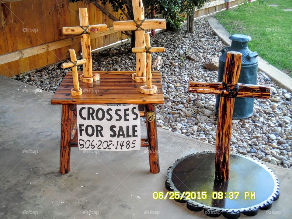 He grew the tree. This is a picture of some crosses that are hand-crafted out of real cedar. My father builds them for extra money.