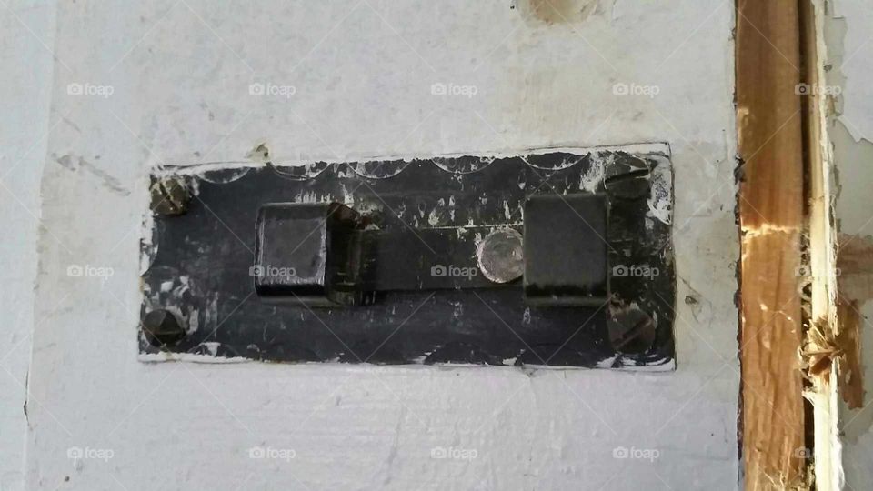 broken security. the original lock on an 1834 farmhouse