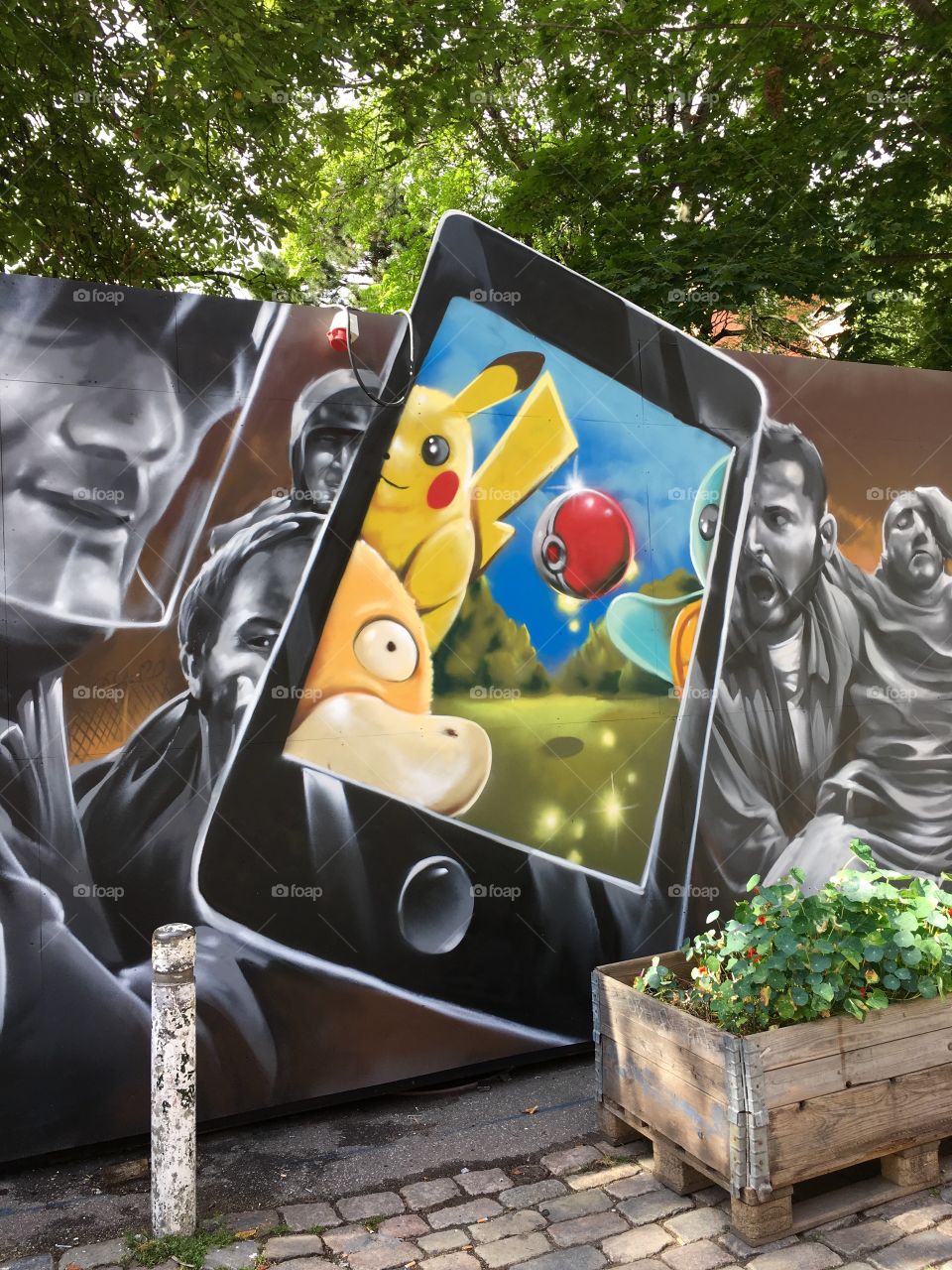 Painted Pokémon Go on wall.