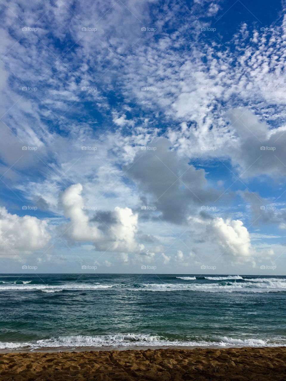 Hawaiian clouds by the sea
