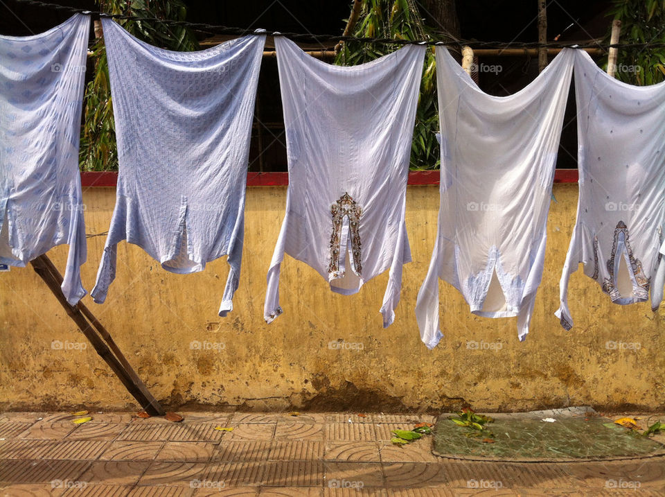 city clothes muslim drying by jasonmbosch