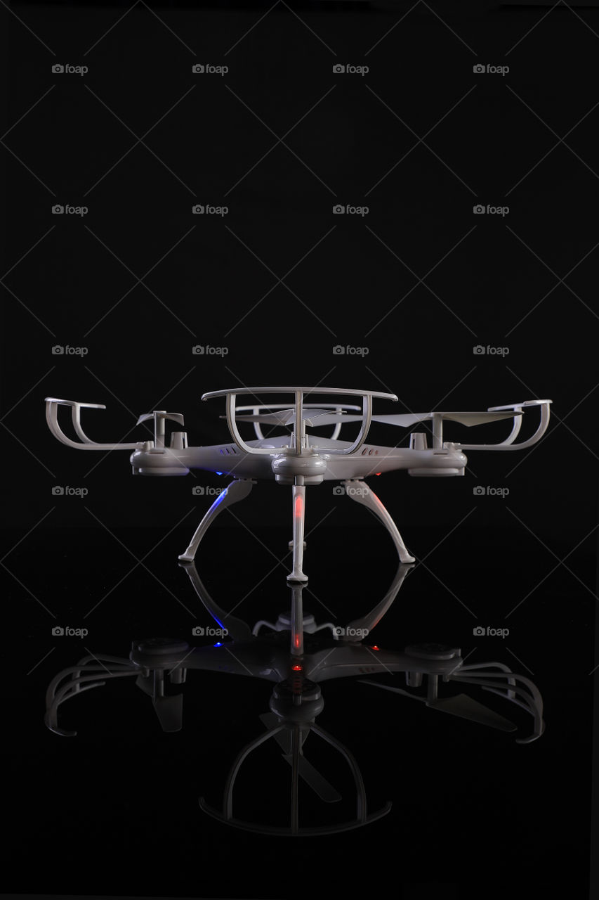 Quad Copter Drone on black background