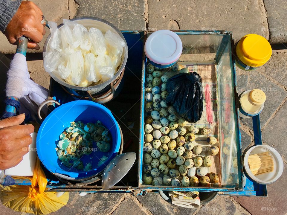 Quail eggs for sale from a street vendor, Cusco Peru