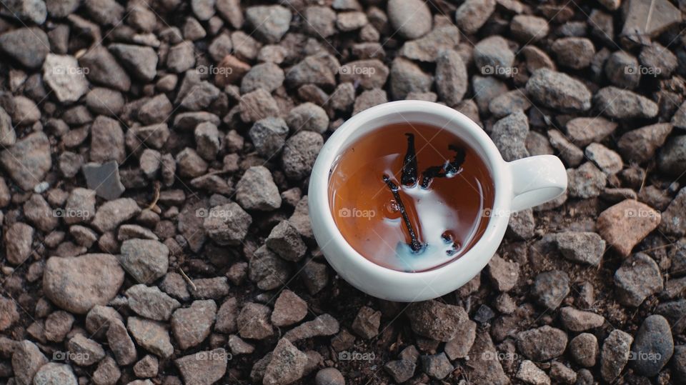 A cup of tea on a pebble