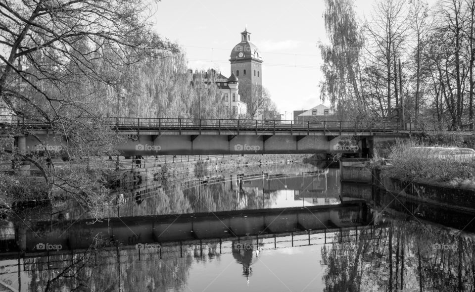 sometimes black and white says even more. let your imagination fill in the fall colours and reflections across the still water. urban city scene