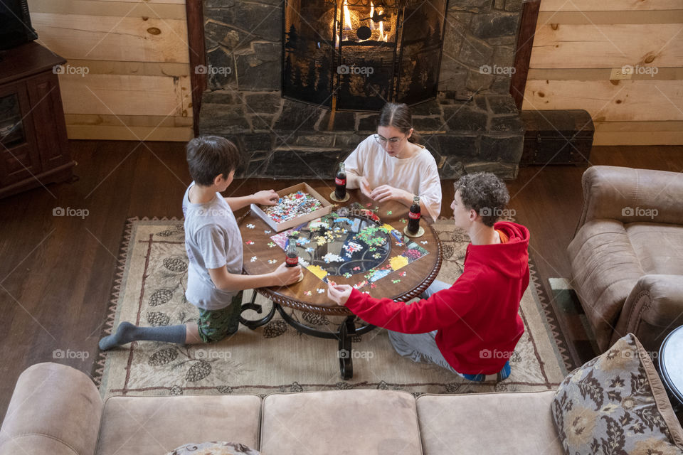 Siblings In Front of the fire